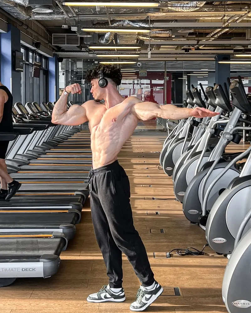 Rachid training in the gym during his transformation